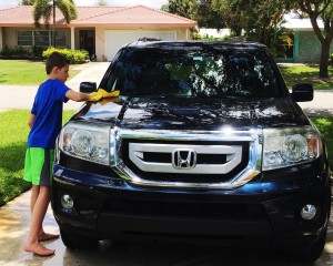 Carson washing car